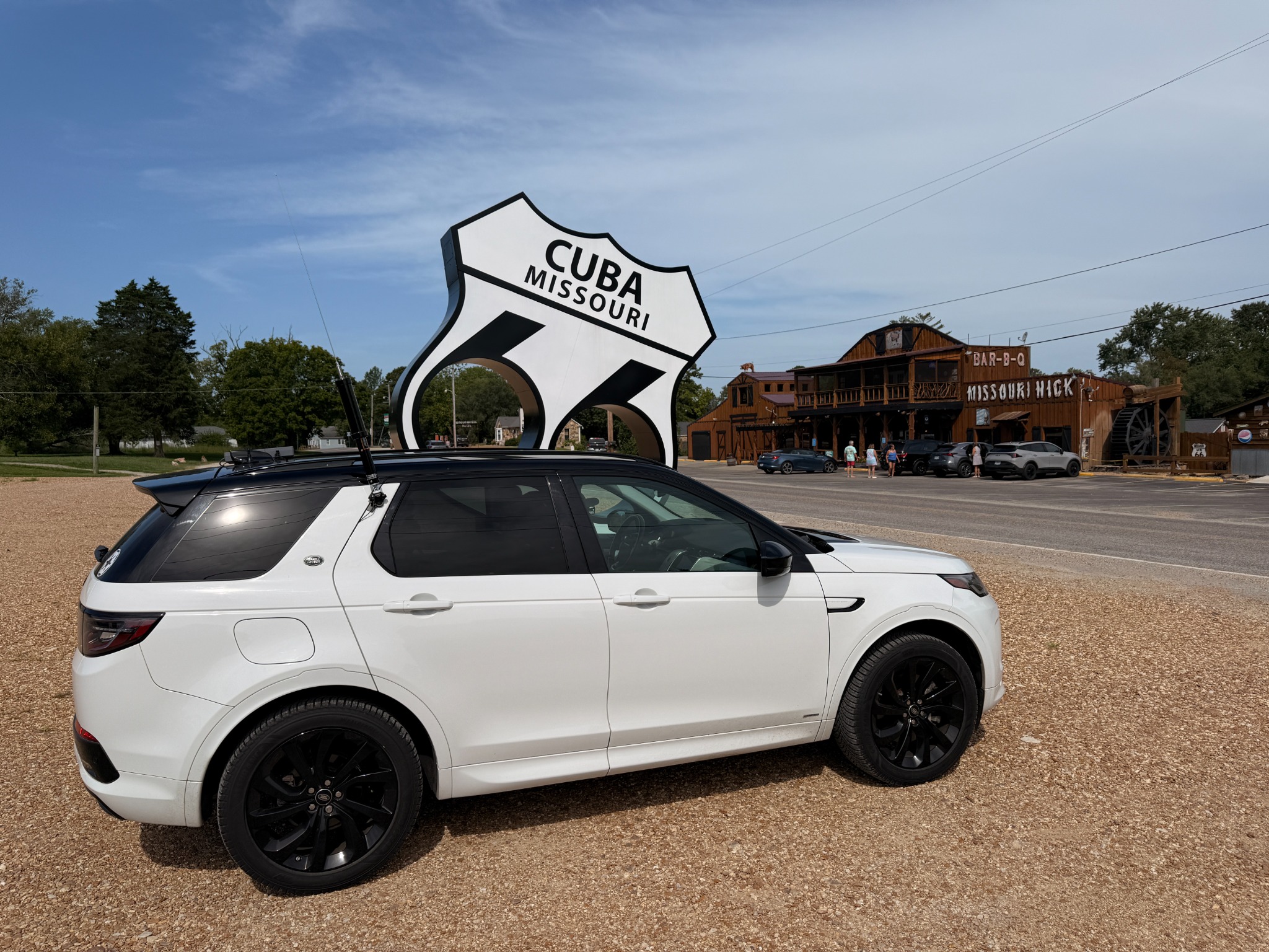 The W6R expedition vehicle at the Cuba Route 66 shield