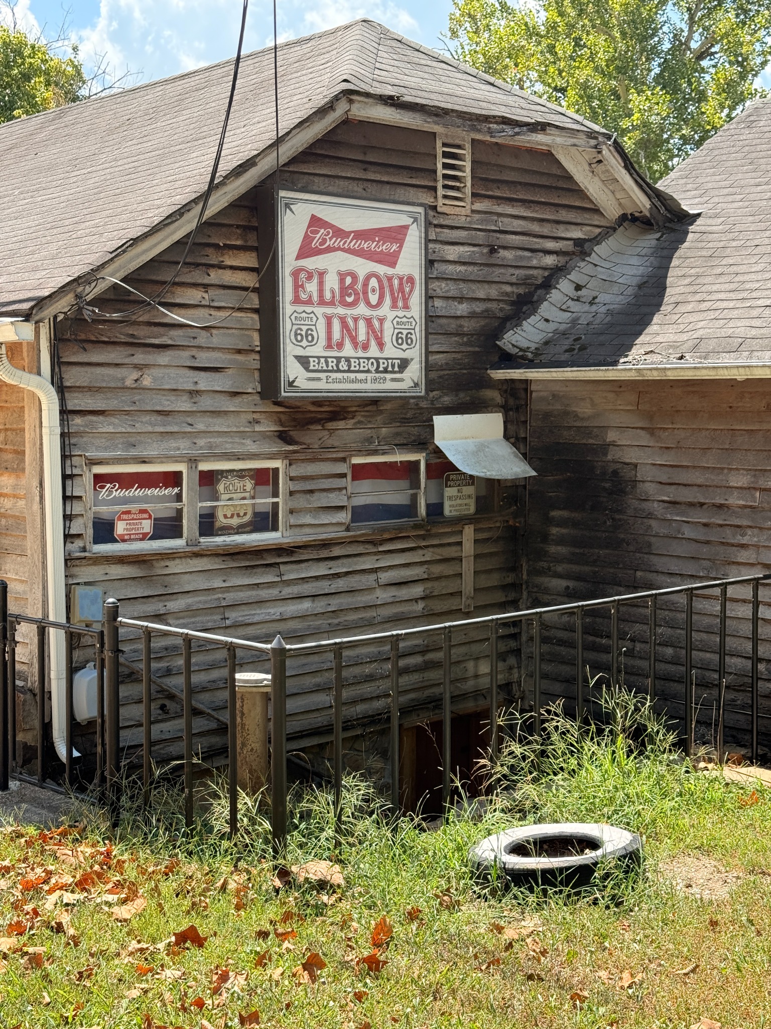 The weathered exterior of the old Elbow Inn