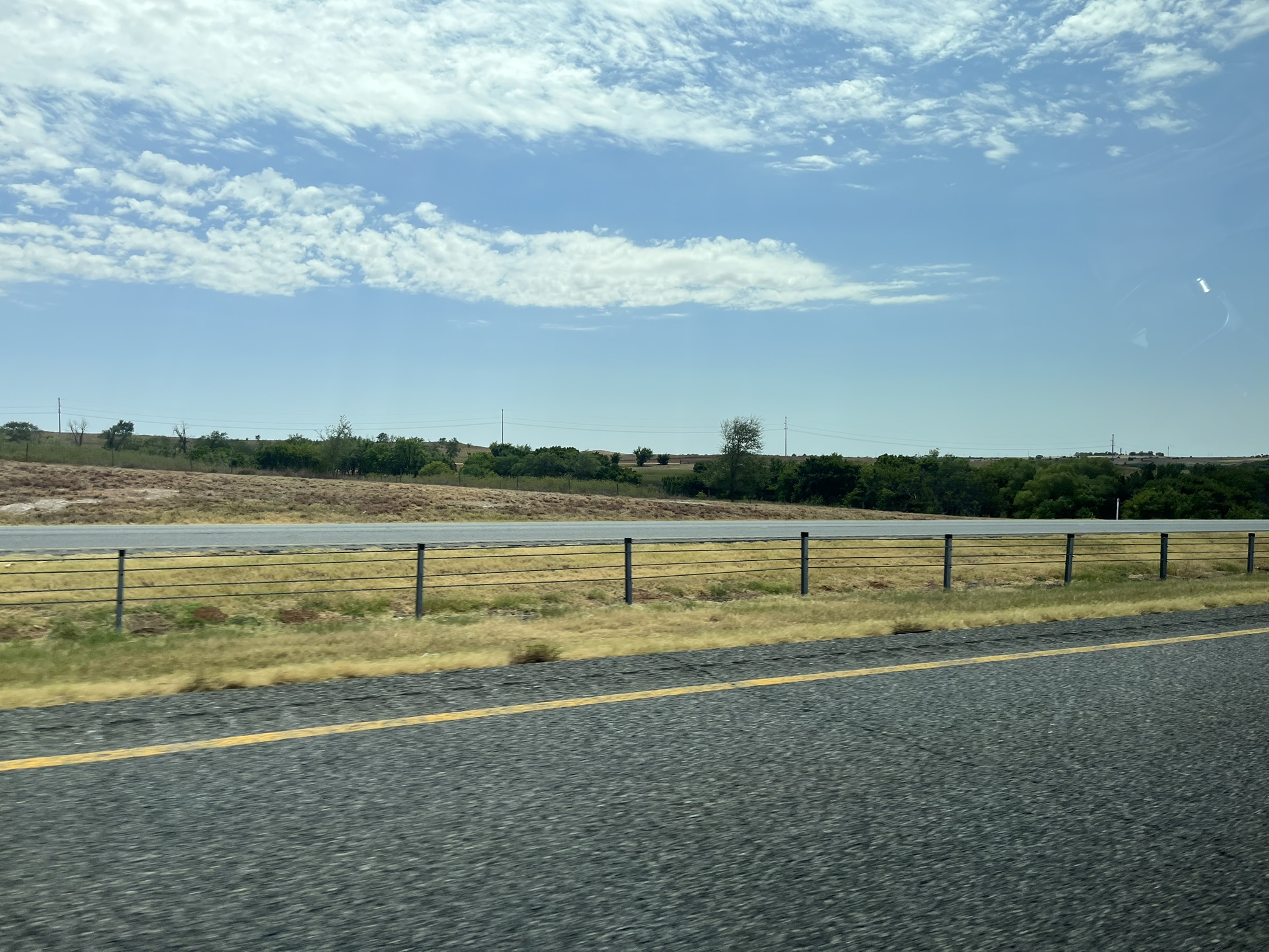 The open road and wide Oklahoma sky.