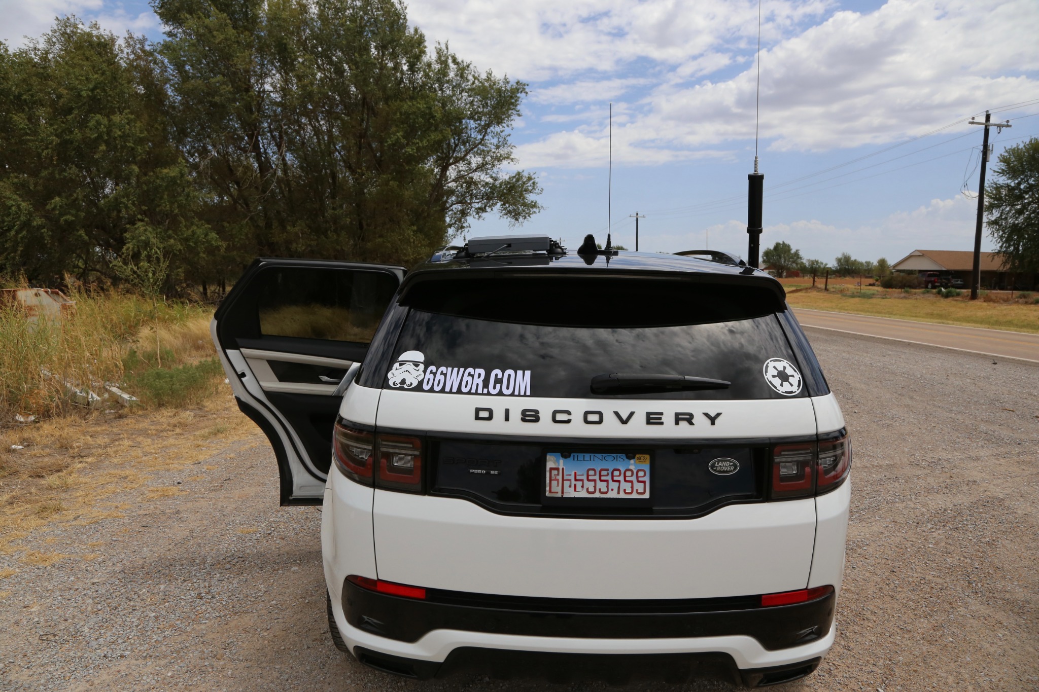 The expedition car and mobile radio setup along the route.