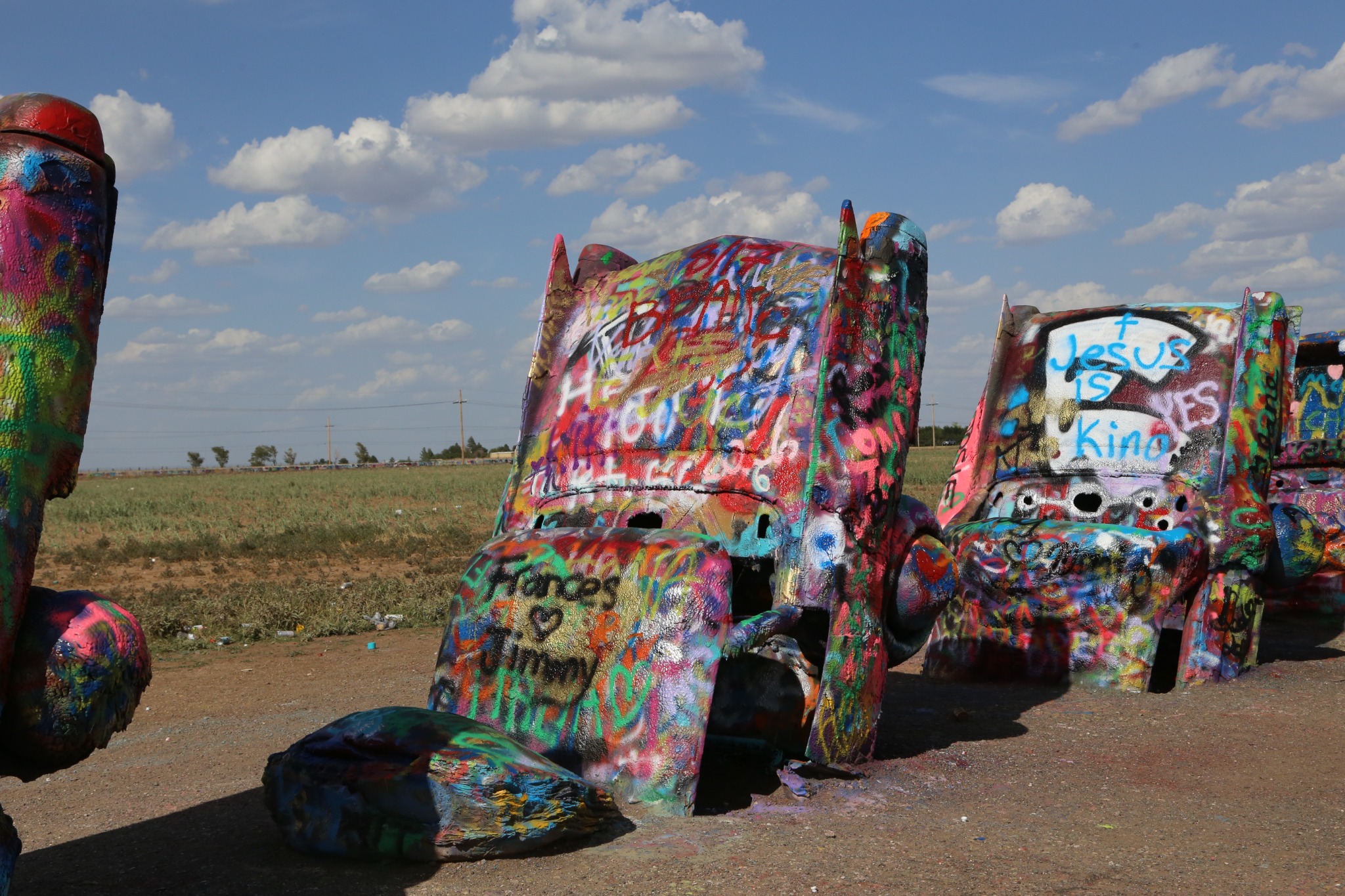 Layers of color and messages at Cadillac Ranch.