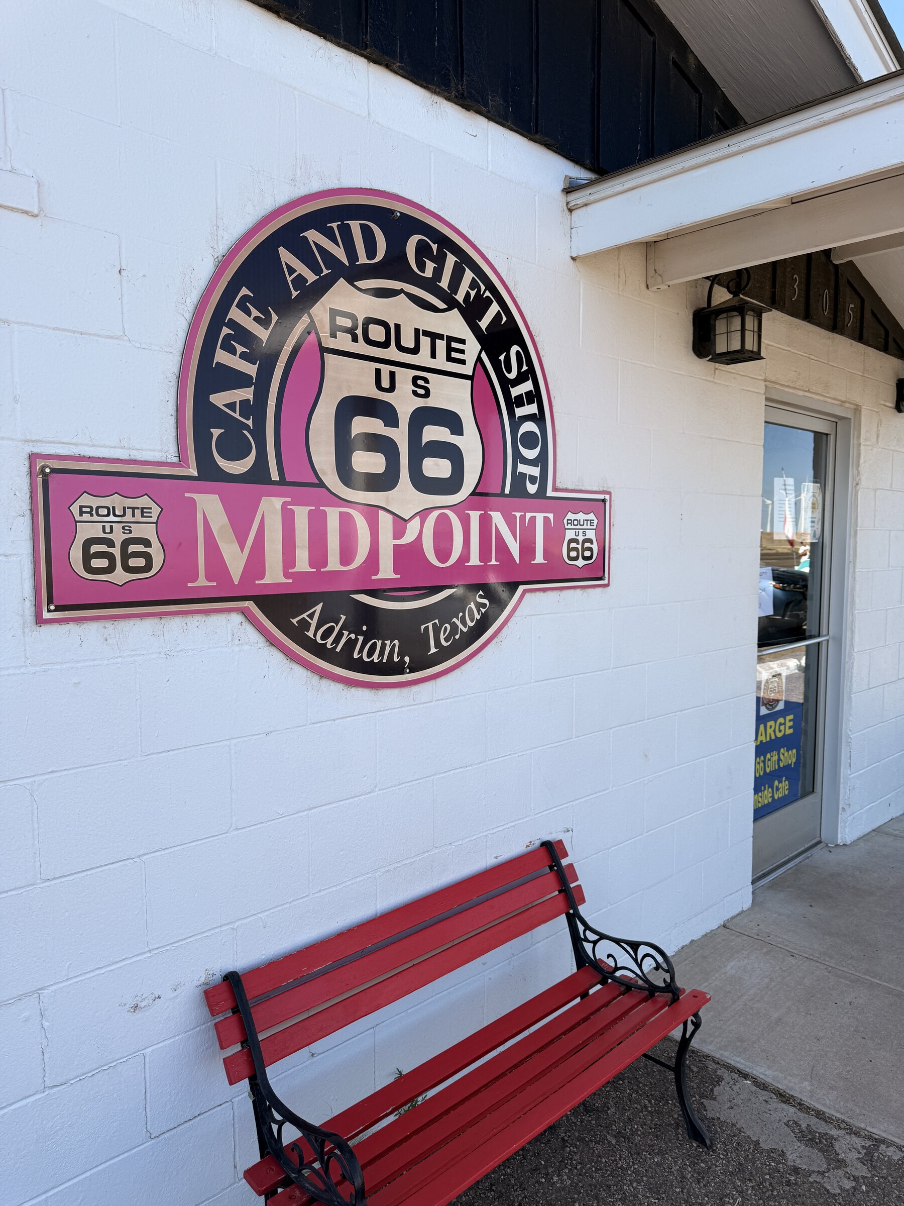 A colorful Midpoint Café and Gift Shop mural in Adrian.
