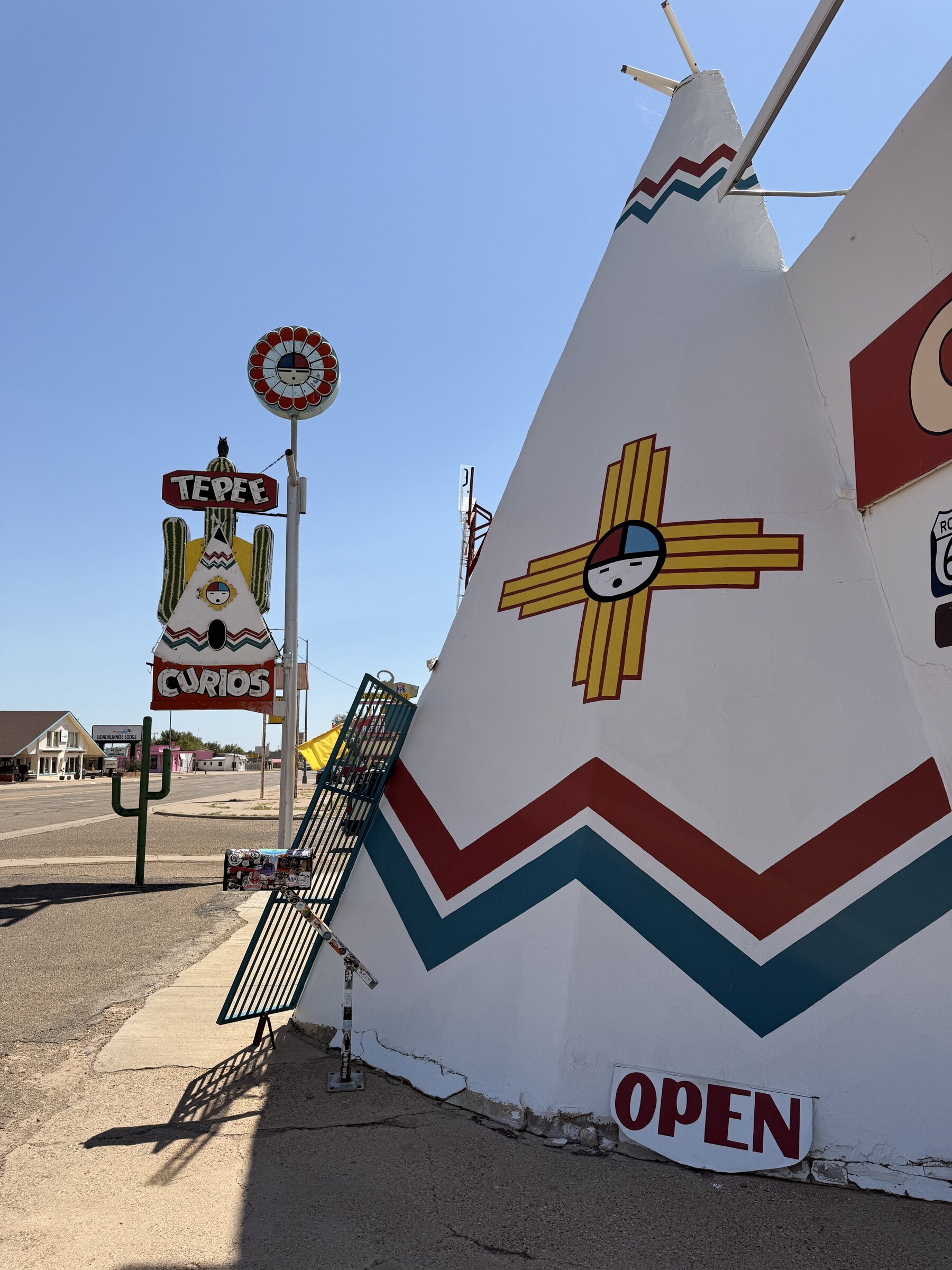 The teepee entrance and vintage neon at Tee Pee Curios.