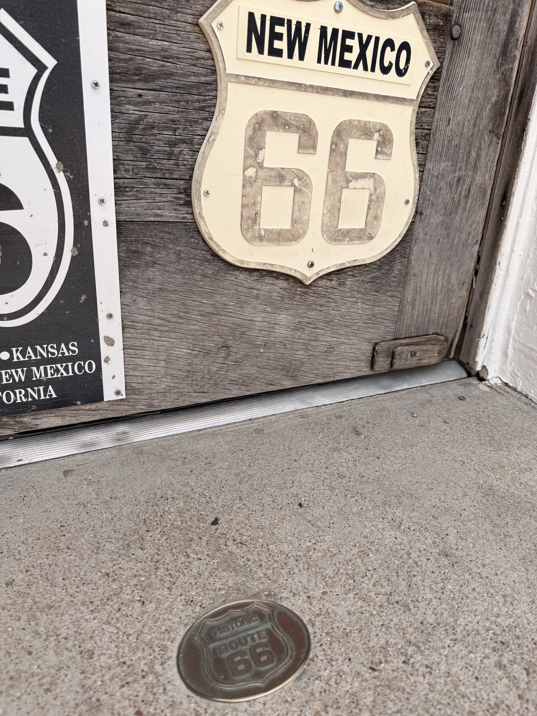 A New Mexico Route 66 marker inside the curio shop.