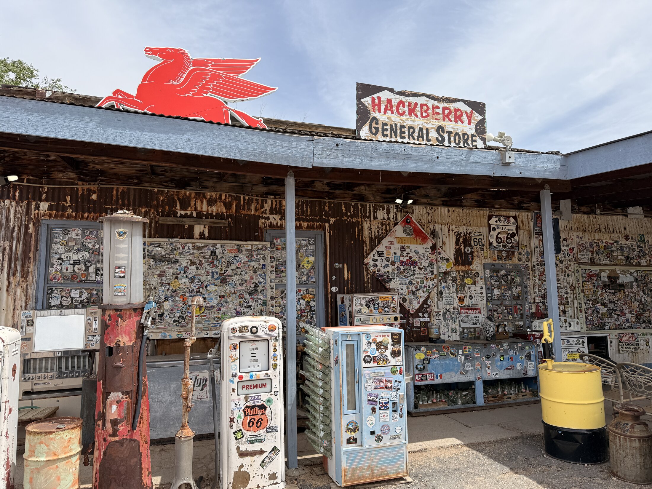 Vintage gas pumps and layers of Route 66 memorabilia at Hackberry.