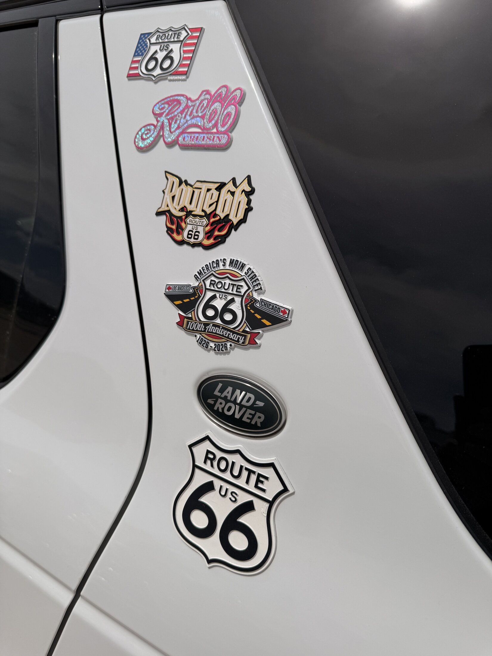 Route 66 badges collected along the expedition’s western journey.