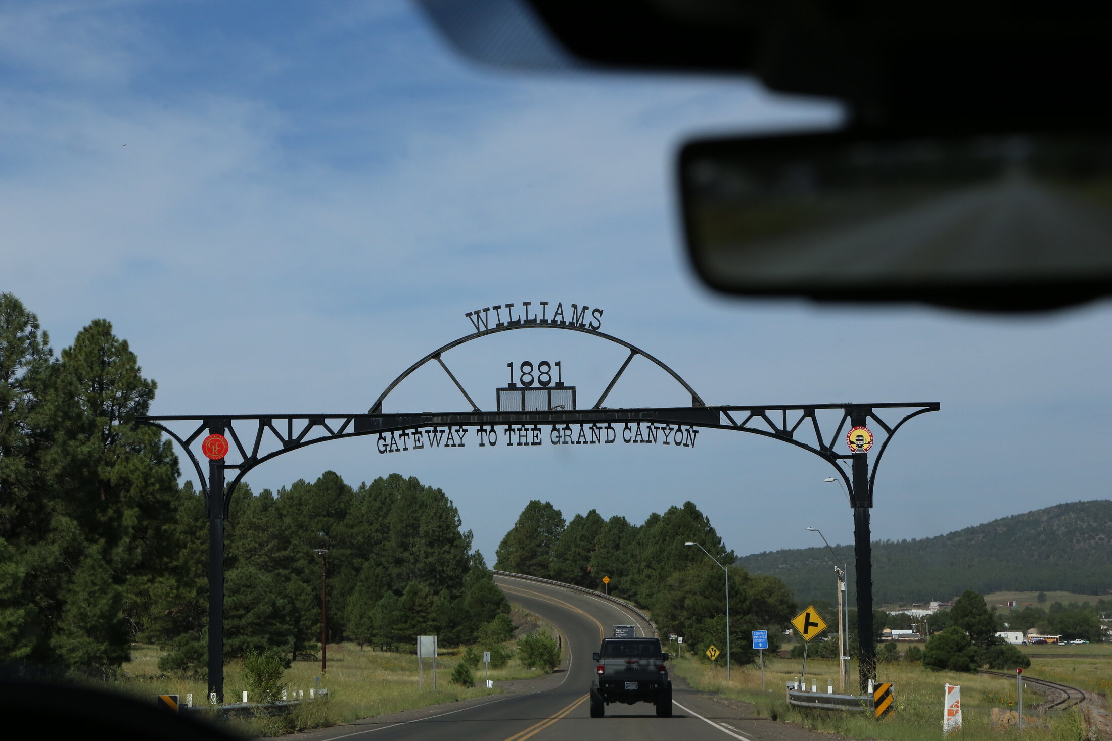 The road into Williams beneath a gateway honoring the town’s railroad history.