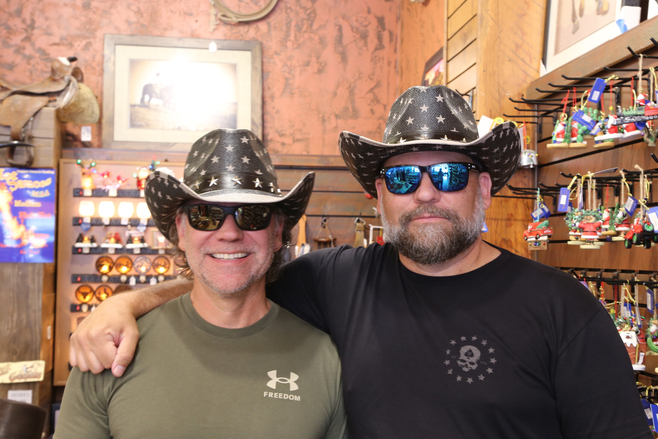 Todd and Mike try on a little Western style in Williams.