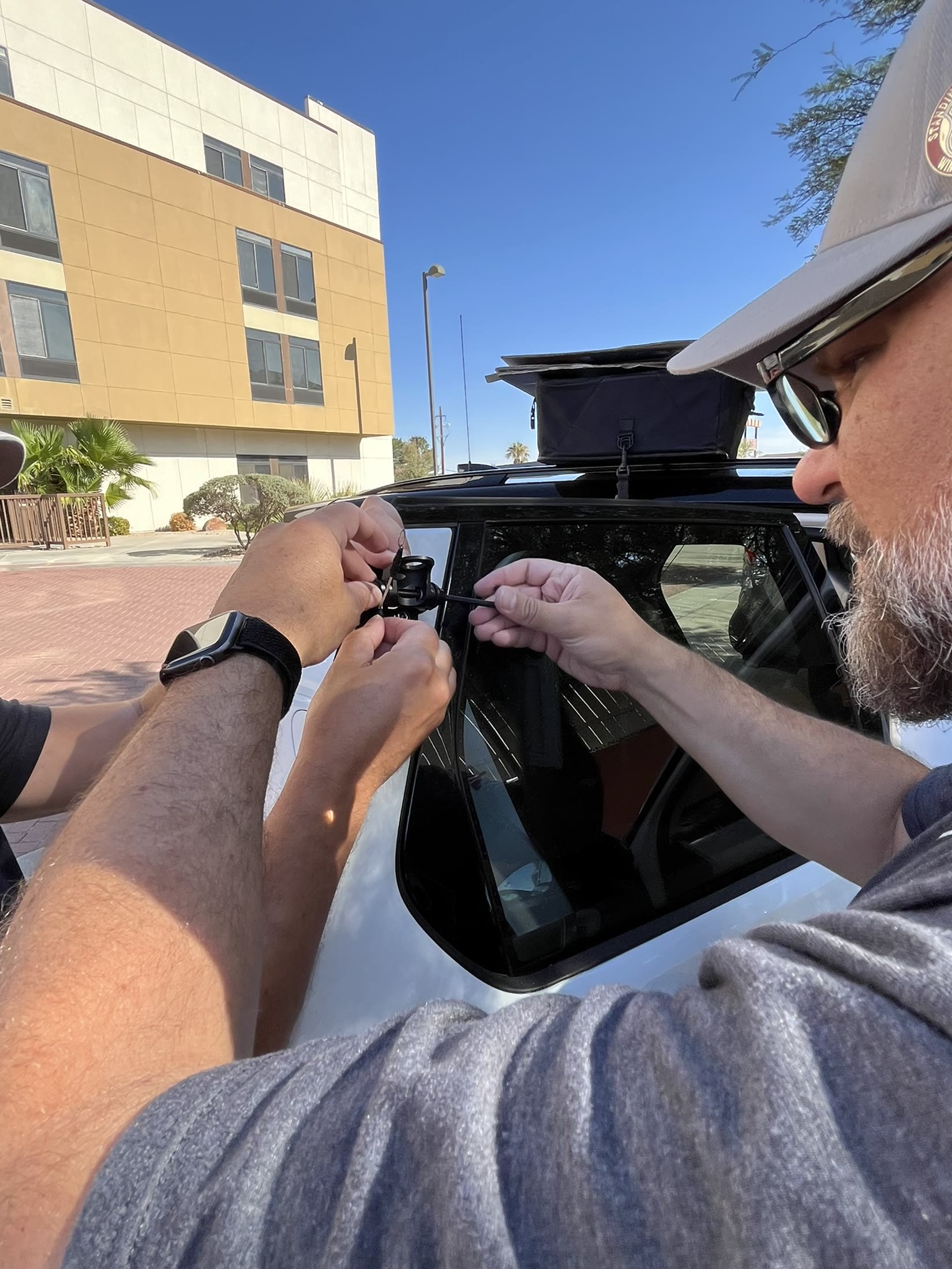 Reattaching the repaired antenna connection before leaving Kingman.