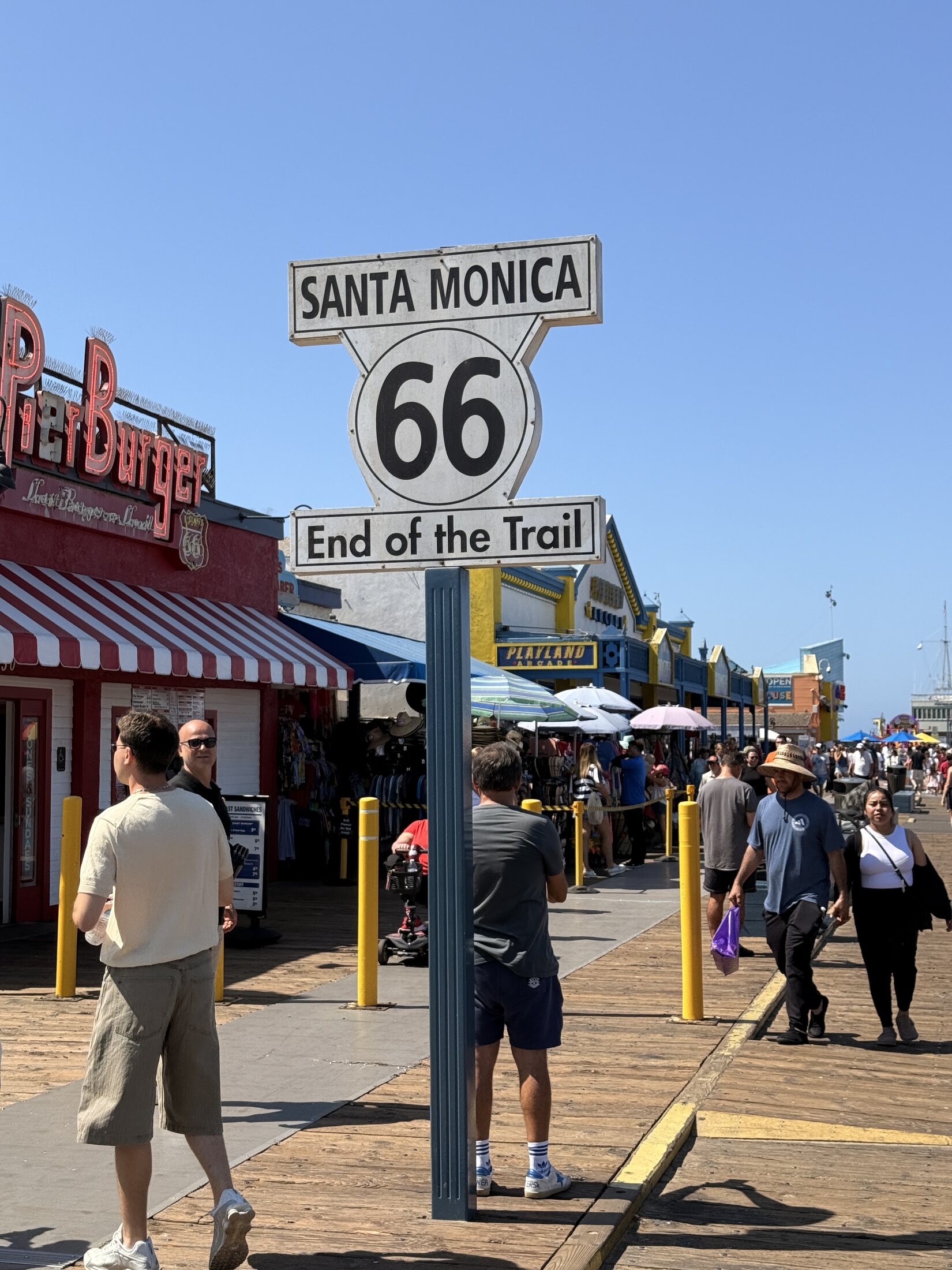 The Route 66 End of the Trail sign on Santa Monica Pier.